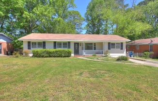 Charming 4 Bedroom, 2 Bath Home with Huge Fenced-in Yard!