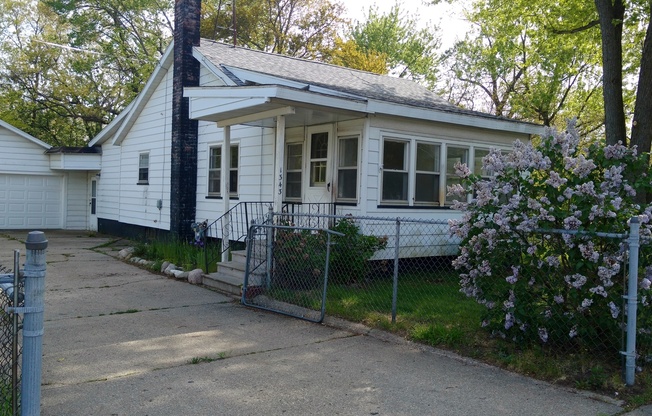 1343 E. Broadway. House with basement and garage