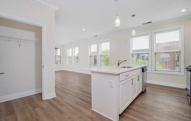 a kitchen and dining area in a 555 waverly unit