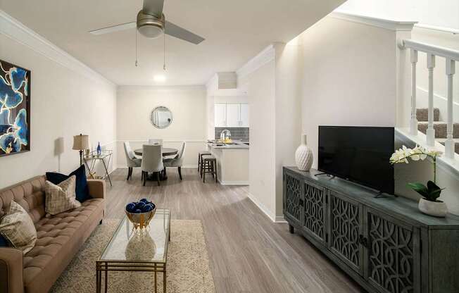 a living room with a couch and a table