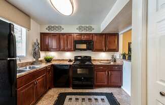 Renovated Kitchen with Black Appliances