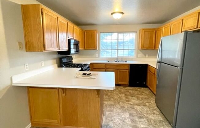 Nice home in NE Bend!  Large lot, fenced yard and A/C!