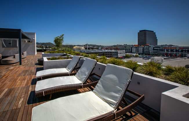 Chaise Lounges and Sundeck, in Glendale, CA, 91203 at Legendary Glendale Luxury Apartment Homes