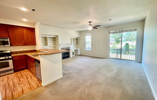 $500 RENT CREDIT! Two Bedroom Townhome with 2 Car Garage, A/C & Private Patio