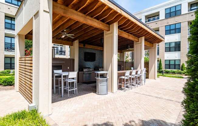 the preserve at ballantyne commons outdoor patio with seating and a grill