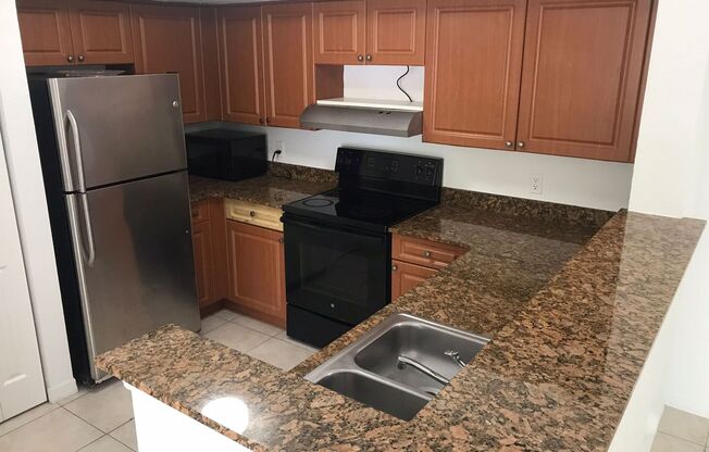 Welcome to Your Ideal Home in North Miami's Gated Community