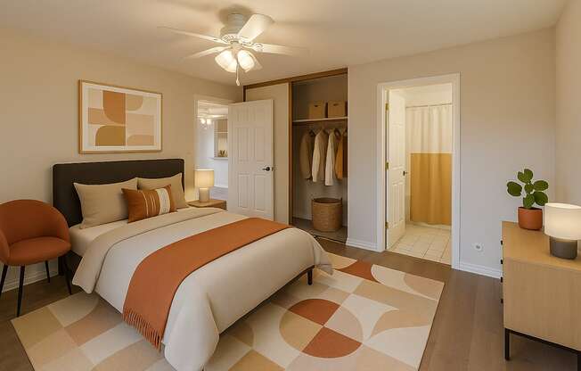 A bedroom with a large bed and a ceiling fan.
