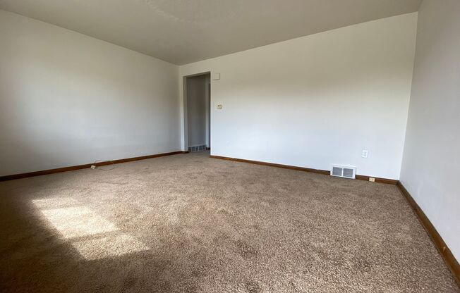 Cozy Two Bedroom Townhome with Central AC & Off-Street Parking! Call Today to Schedule a Tour!