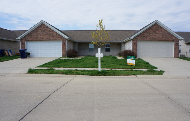 Wake up to a stunning pond view in this open floor plan beautiful 2 BD 2BA duplex with a 2 car attached garage