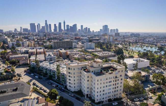 A cityscape with a clear blue sky above.