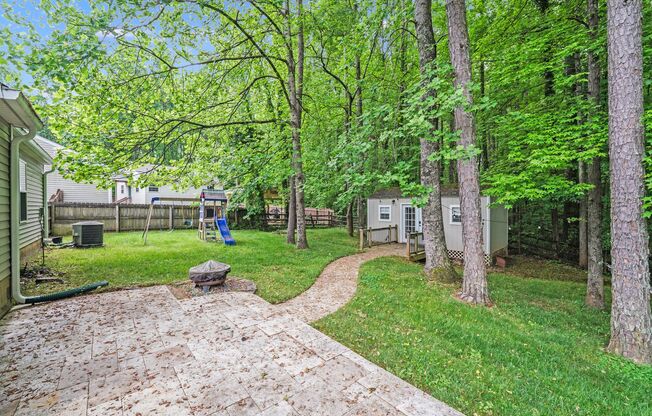 Comfort Meets Function in This 3BR/2BA Cedar Lane Farms Ranch with Backyard Retreat