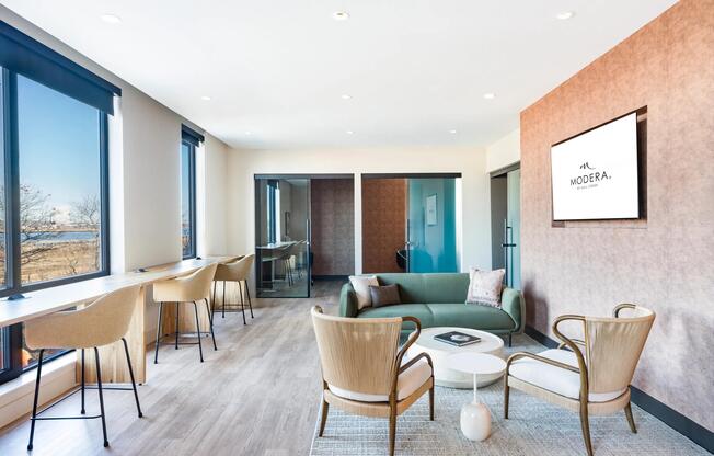 A refined coworking lounge with quiet nooks, natural light, and spaces designed for focus or collaboration.