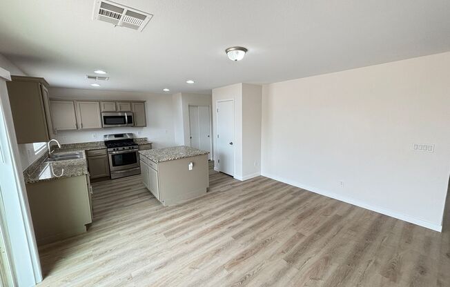 Gorgeous 4Bed/2.5Bath/2Car home located in North Las Vegas Raven Hill gated community!