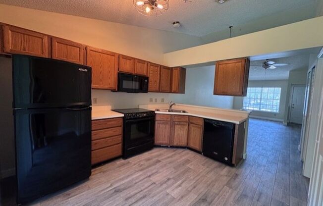 Second floor, 2/2 unit with wooded view near UCF