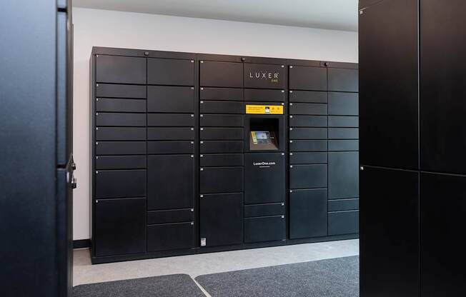 a row of lockers in a room with one door open