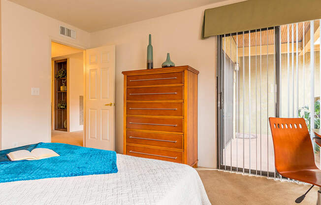 El Dorado Place bedroom with glass sliding doors. 