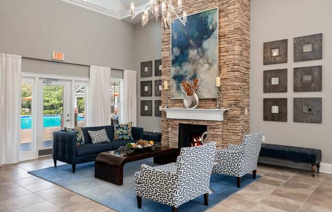Carrington Place at Shoal Creek - Resident clubhouse social area with fireplace