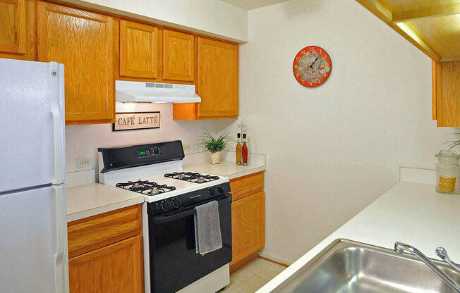 Well Equipped Kitchen at The Harbours Apartments, Clinton Twp, MI