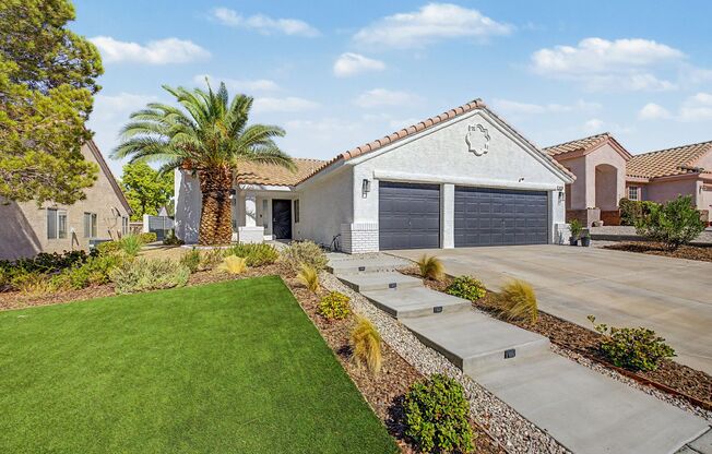 Gorgeous remodeled single story home in Henderson with 3 car garage!