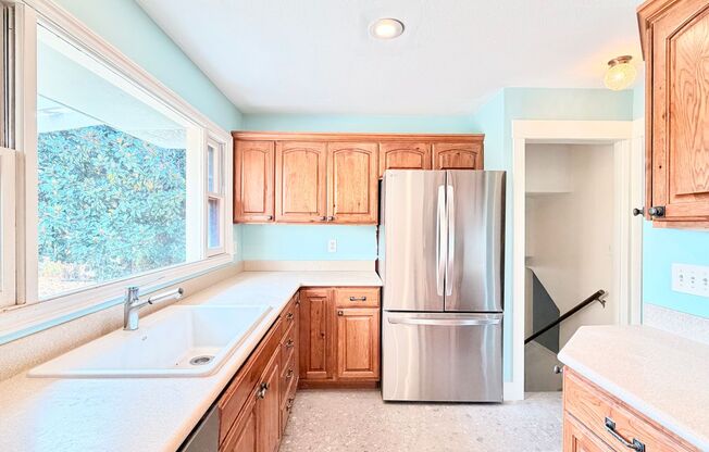 Charming Updated 1950s Home with Refinished Hardwoods & Large Fenced Yard – Landscaping Included!