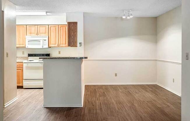 Wood Floor Dining Room at Newport Colony Apartment Homes, Casselberry, Florida