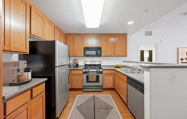 the preserve at ballantyne commons apartment kitchen with stainless steel appliances