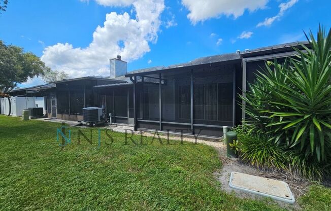 LOCATION LOCATION! 2/2 1234 Sq. Ft. with HUGE living room, community pool, indoor laundry and giant screen porch!!