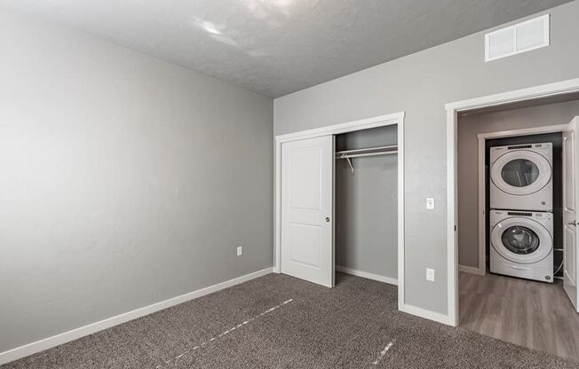 a laundry room with a washer and dryer