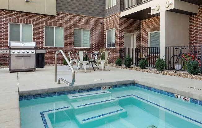 our apartments have a swimming pool and outdoor furniture