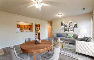 a living room with a couch and a table