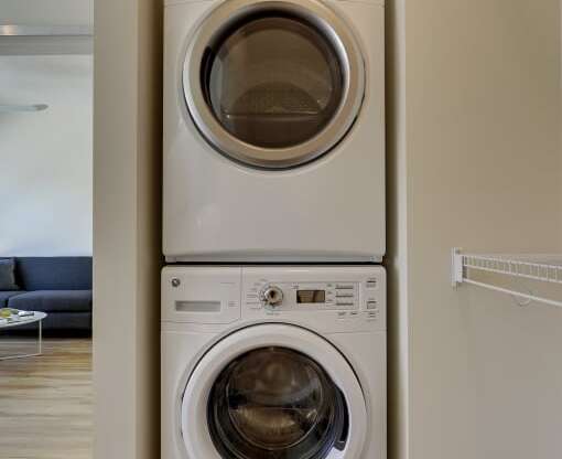 Washer dryer stack in the closet of Flat E at Coze Flats