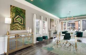 a living room with a green ceiling and white walls