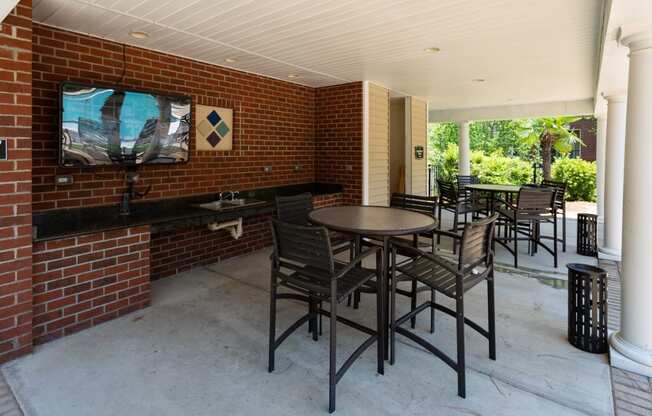 Shaded Outside Sitting Area at Abberly Village Apartment Homes by HHHunt, West Columbia, SC, 29169