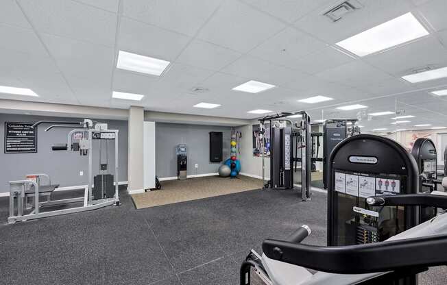 Gym with a variety of equipment including weights at Columbia Pointe, Columbia, MD, Maryland , 21045