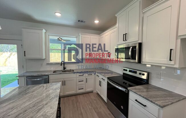 Stylish 3 Bed, 2 Bath Home in Gated Lakeside Community!