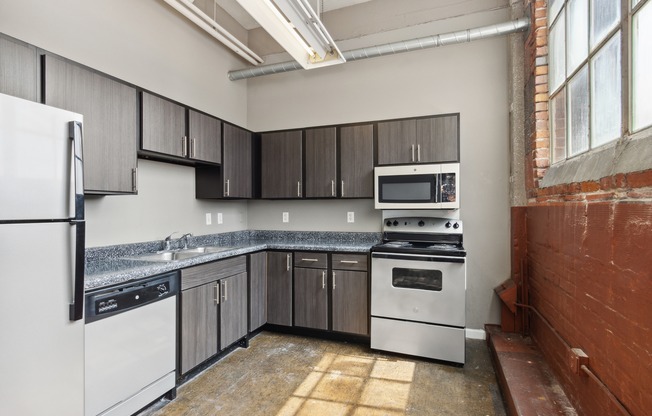 Cold Storage Lofts | Kansas City, MO | Spacious Kitchen w/ Stainless Steel Appliances
