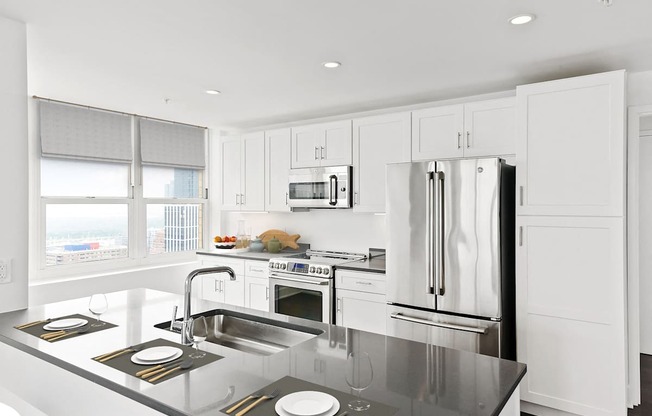 Kitchen area with appliances at 65 Bay Street, New Jersey, 07302