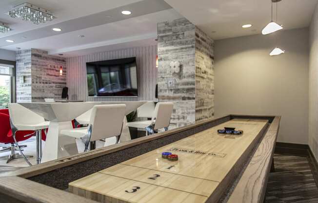 NoBe Market Apartments shuffleboard and lounge