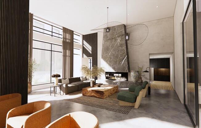 Resident lounge featuring cozy seating, grand fireplace, and open, airy views at Modera Revere Beach.