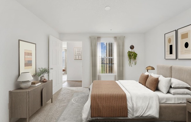 a bedroom with white walls and a large bed with a white blanket