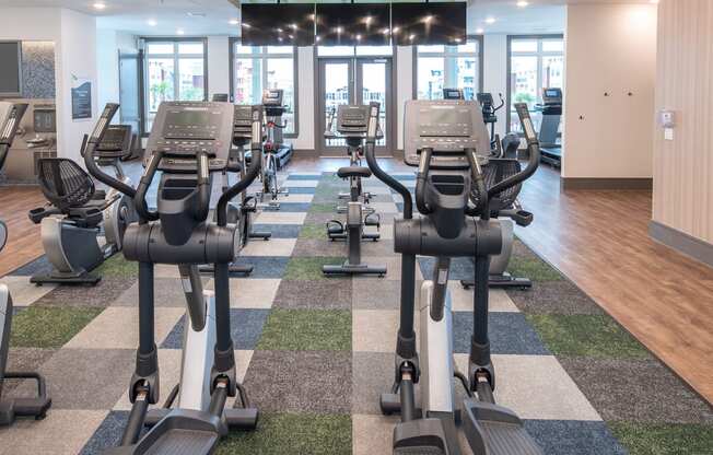 Lewisville, TX Apartments for Rent - Hebron 121 Station Fitness Center with Excercise Bikes, Ellipticals, Treadmills, and More