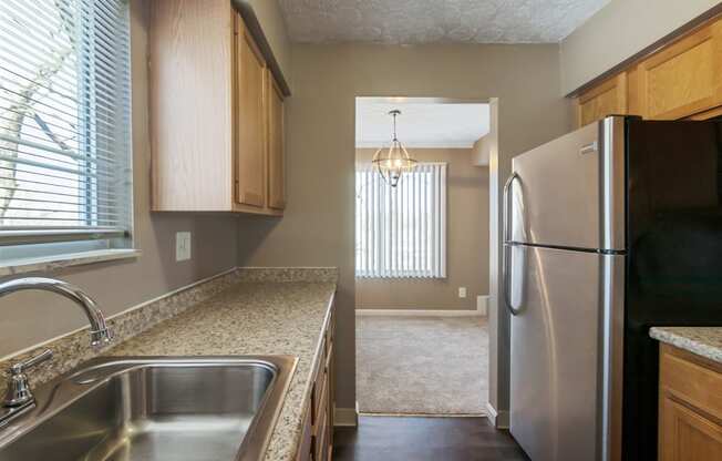 This is a photo of the kitchen of an upgraded 650 square foot, 1 bedroom apartment at Deer Hill Apartments in Cincinnati, OH.