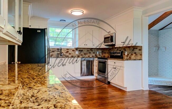 Stylishly Renovated Four Bedroom Home in Hermitage Hills!