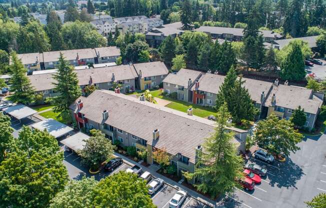 a view from the sky of a group of buildings and trees at Quartz Creek, Washington, 98043