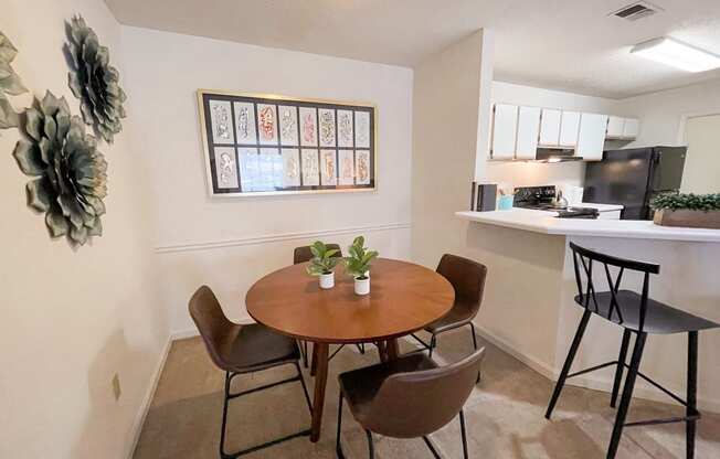 The Crest at Berkeley Lake model apartment dining space located in Duluth, GA 30096