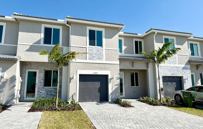 Brand new 3 bed 3.5 bath Townhouse with yard, garage and impact-resistant windows within Luxurious Community Terra Sol