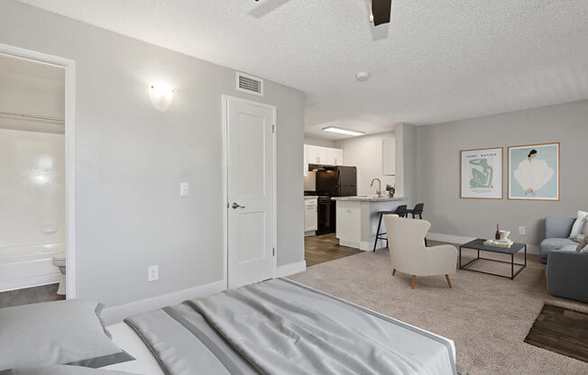 Model Studio Bedroom with Carpet at Stillwater Apartments in Glendale, AZ.