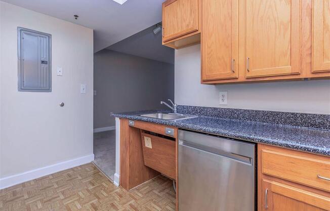 a kitchen with a sink and a dishwasher