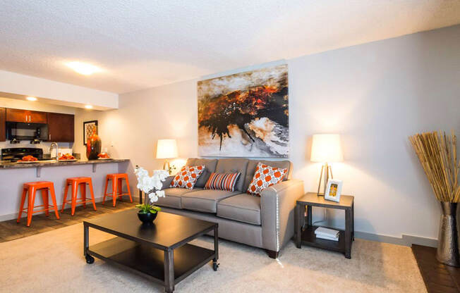 a living room with a couch and a table at Skyview Apartments, Colorado, 80234