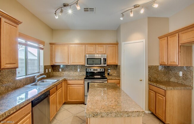 Beautiful five bedroom, 2.5 bath home with a large loft in the San Tan Heights community.
